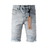 Purple Jeans Men's Vintage Light Wash Ripped Denim Shorts with Raw Cut Hem and Distressed Details 2003