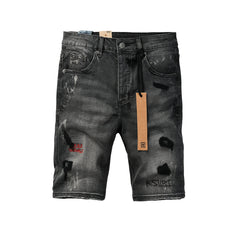 Purple jeans Men's Washed Black Distressed Denim Shorts with Graffiti Patchwork and Urban Street Style Detailing 2009