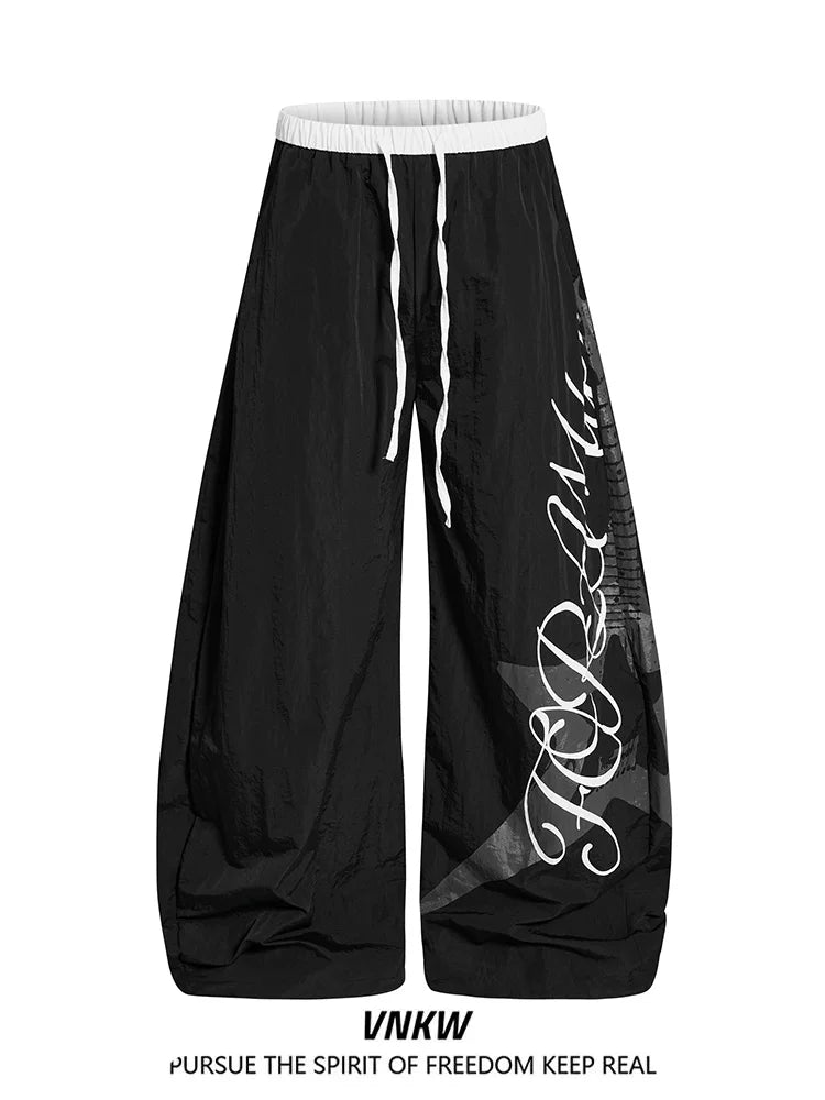 American letter printed pleated quick drying curved knife work pants for men and women in summer, thin, dancing, loose, wide leg paratroopers