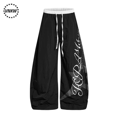 American letter printed pleated quick drying curved knife work pants for men and women in summer, thin, dancing, loose, wide leg paratroopers
